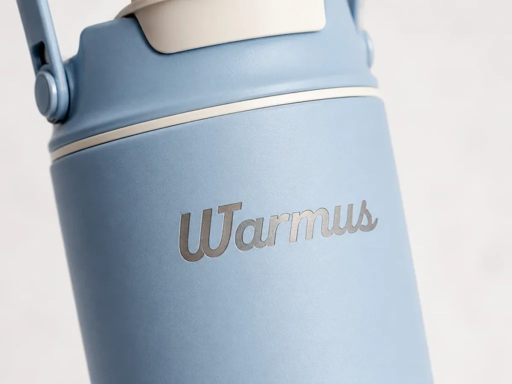 Laser engraved logo on a stainless steel tumbler