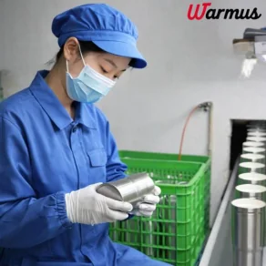 Quality inspection of stainless steel drinkware components in the Warmus factory