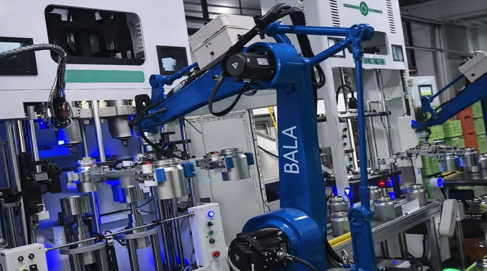 Automated bulk production equipment for custom stainless steel drinkware at Warmus